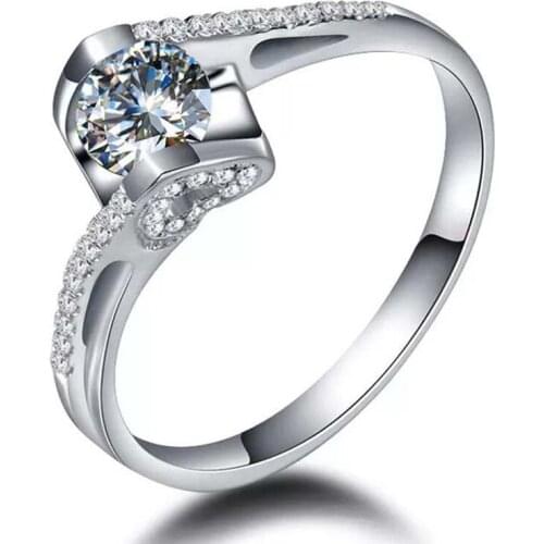 Canadian jewelry artificial Mossan stone twisting arm angel kiss pure silver mesh red ring simulation diamond female row drill