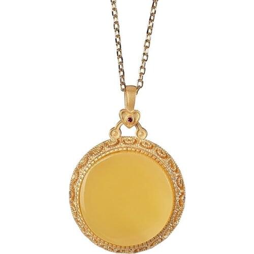 S925 sterling silver gold-plated natural amber wax pendant retro hollow pattern can be opened perfume bag pendant