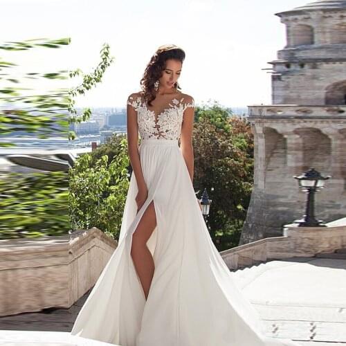 Elegant A-Line Chiffon 2017 Beach Wedding Dresses Sheer Neck Lace Appliques Hot Sale Thigh-High Slits Bridal Gowns Sexy Back