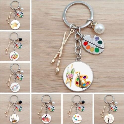 New painter tools-palette and brush keychains. Cabochon glass pendant keychains suitable for chartered cars