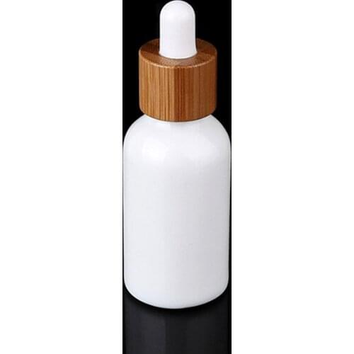 Empty dropper bottle 100/pcs 10ml 15ml 20ml 30ml 50ml 100ml porcelain white glass with bamboo lid dropper bottle box