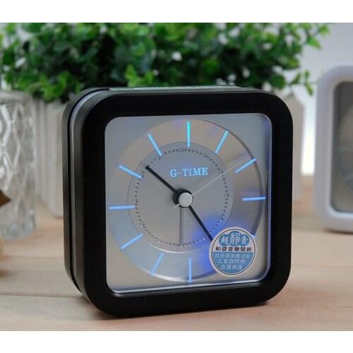 Hot sale fashion noctilucent mini alarm clock bedside mute children student bedroom alarm clock Kids 9.2cm * 9.2cm * 4cm