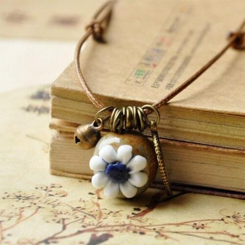 Ethnic Ceramic Flower Necklaces Women Hollow Leaf Pendants Choker Weave Rope Chain Adjustable Bronze Bell Charm Jewelry