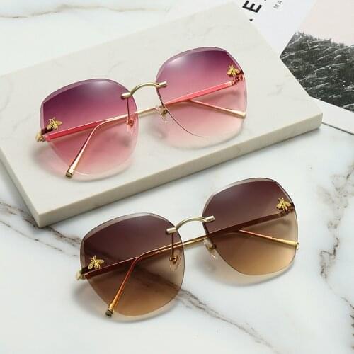 New sunglasses euramerican fashion glasses trimming frameless sunglasses metal UV400 ms sun glasses