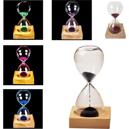 Pink wood + glass + iron powder sand iron flowering magnetic hourglass with packaging hourglass 13.5 * 5.5cm wooden seat 8 * 8