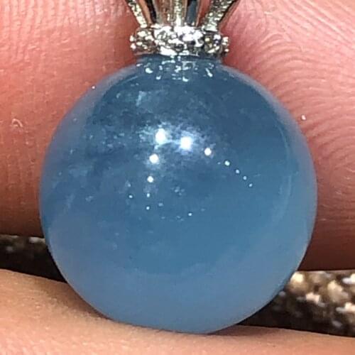 Natural aquamarine pendants are made to absorb reiki and heal