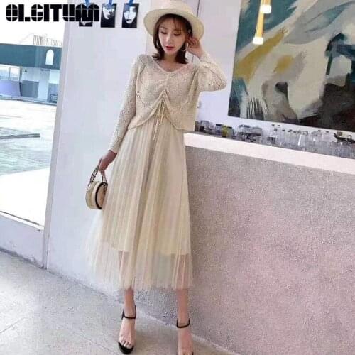 OLGITUM Womens New Suit V-neck Silver Line Hook Flower Hollow Drawstring Sleeve Sweater+Skirt Two-piece Suit Women Set WS171