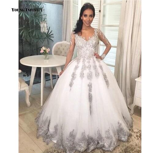 Sexy Ball Gown Wedding Dresses 2021 Long Sleeves Bridal Gown Button Back Scoop Chapel Train White Applique Plus Size Bride