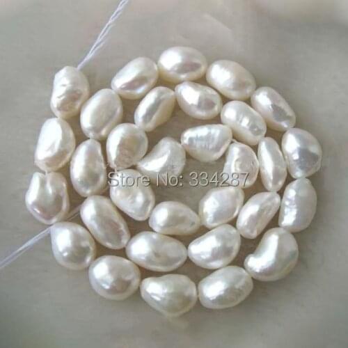 Wholesale around AAA 9X11mm Natural 15" white baroque freshwater pearl