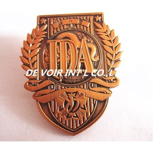 Die struck medal, pin badge with antique copper plating