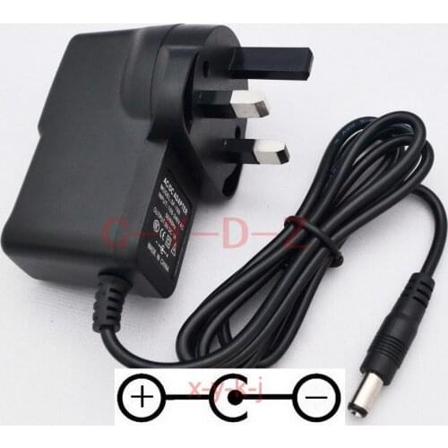 100PCS High quality AC/DC 9V 1A Switching Power Supply adapter Reverse Polarity Negative Inside UK plug 5.5mm x 2.1mm-2.5mm