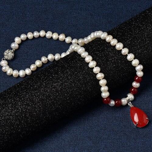 The 8-9 mm water Natural Pearl Necklace with Four translucent red balls connected with a bright red droplet 16*26*8 mm Pend