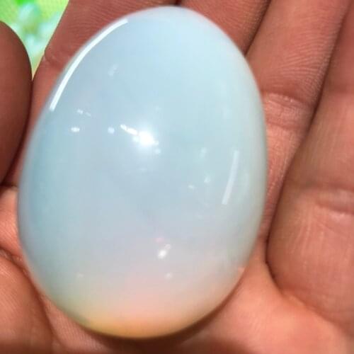 1pcs An opal natural quartz stone egg-shaped magic crystal protein gem