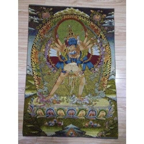 A golden silk embroidery thangka Tibet and Nepal exorcism peace and wealth