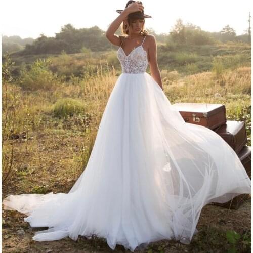 Wedding Dress A-Line Sweetheart Spaghetti Straps Backless Lace Appliques Sequined Beads Floor Length Sweep Train Bride Gown 2021