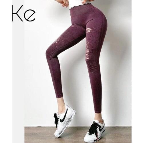 KE net red peach hips fitness pants womens hole-like denim leggings high waist stretch yoga pants