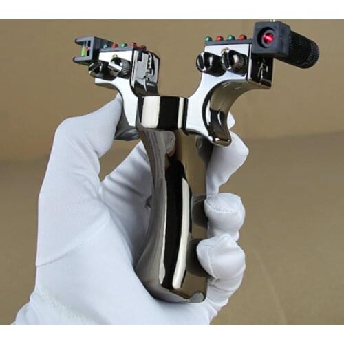 A laser sighted slingshot equipped with a spirit level is used for outdoor sports hunting with a high-power slingshot catapult