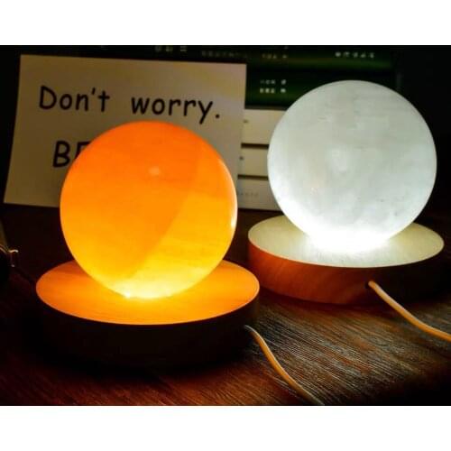 Stones and crystals iceland crystal ball optical calcite sphere Including the base