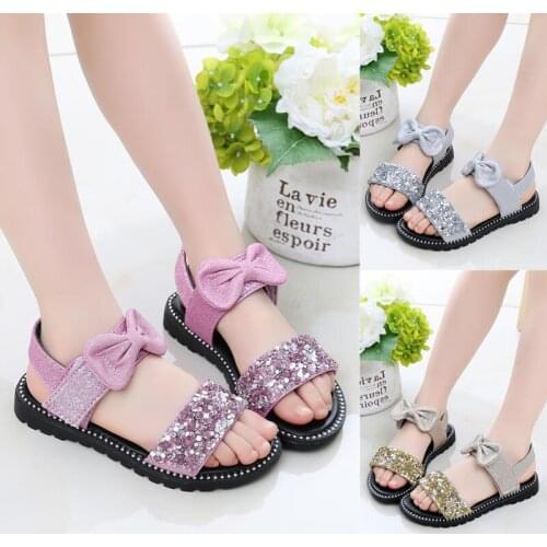 Girls PU sandals 2020 new fashion Korean soft bottom bow princess shoes big children flat bottom little girl Sequin beach shoes