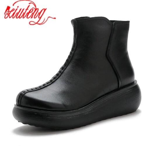 Xiuteng Flat boots women 2020 winter new round head leather thick heel short boot women rubber bottom non-slip short boot women