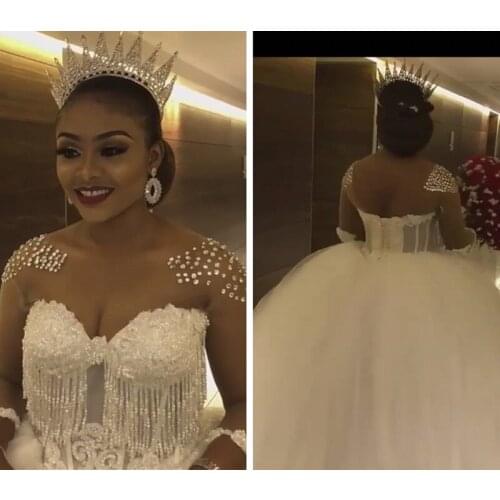 2020 Sheer Neck Beaded Crystal Ball Gown African Wedding Dresses Tassel Bridal Gowns Lace Up Lace Appliques Vestidos de Mariee