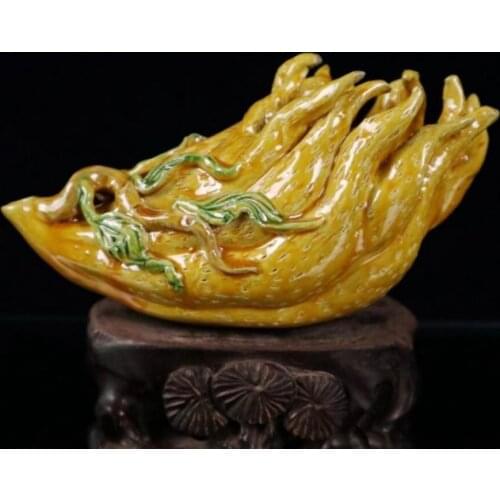 China Yellow glaze ceramic Buddha hand pen wash crafts statue