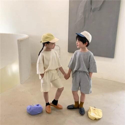 Summer Solid Color Loose Unisex Short Sleeve Sports Sets Boys And Girls Cotton Soft Tracksuits Children 2pcs Sets Fashion