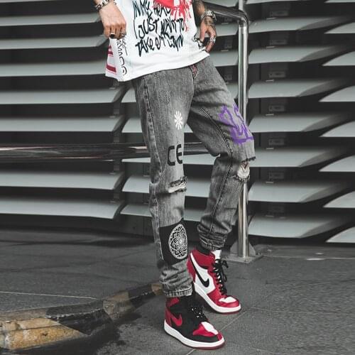 Graffiti Printed Hole Jeans Mens Streetwear Fashion Personality Loose Straight Slim Pencil Pants Vaqueros Hombre Denim Pants
