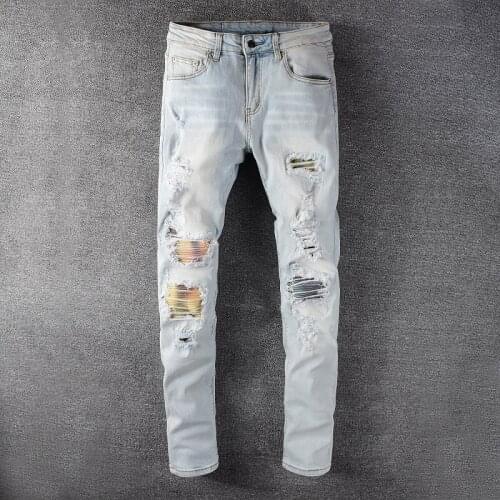 2021 New Mens light blue colored patchwork pleated ripped biker jeans Streetwear slim skinnt stretch denim tapered pants