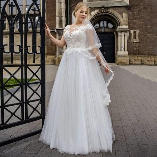 Charming Tulle A-line Plus Size Wedding Dress 2021 Custom Made Lace Appliques Scoop Neck Cap Sleeve Bridal Gowns
