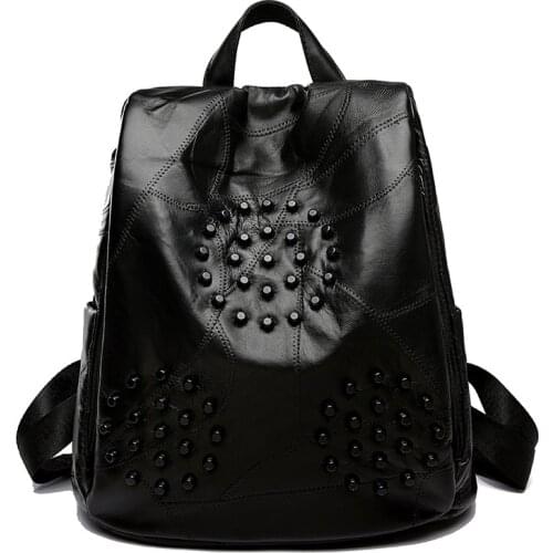2021 Womens Solid Black PU Leather Pocket Safe Backpack Unisex Tiger Head Surrounding Sun Shape Star Rivet Rucksack
