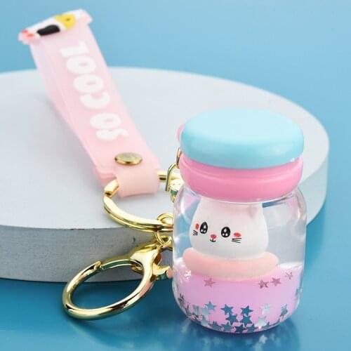 Cute Cartoon Floating Liquid Cat Macaron Keychain Cute Milk Bottle Crystal Quicksand Surfing Cat Keyring Pendant Gift Keyfob