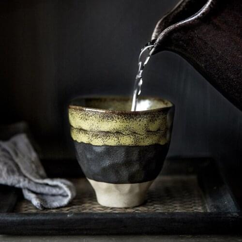 Creative personality Japanese style kiln change ceramic pottery tea cup tea cup stoneware casual cup Kung Fu tea set master cup