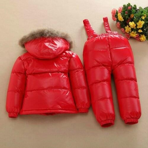 Dow jacket coat Child winter suit fashion baby new thick warm warm strap solid color hats boys and girls shiny duck down suit
