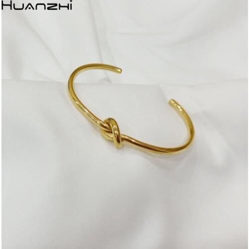 HUANZHI 2019 New Design Rose Gold Metal Copper Plated Knot Twisted Bracelets for Women Girl Bangle Party Jewelry Gift