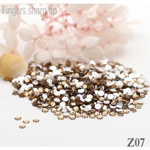 2017 Fingers Sharp Tip 1000pcs New champagne color 14-sided Resin 2mm Round Fashion Popular Nail DIY Decorative Diamond SS6 Z07