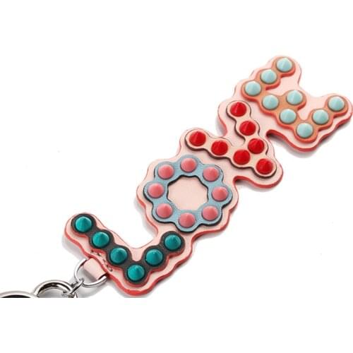 Women Bag hanger Love Pendant Genuine Leather Rivet Pendant Charm Ornaments For Women Key Chain Bag Pendant Accessories Key Ring