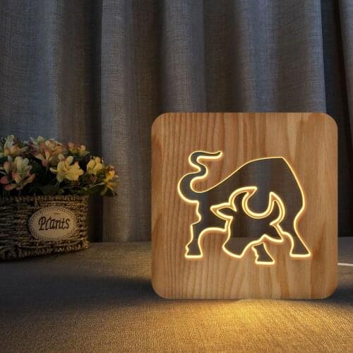 Bullfighting table lamp new strange electronic product solid wood night light factory direct sales