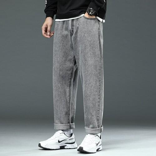 High quality mens oversized jeans man casual loose fit straight pants plus size mens fashion simple trousers