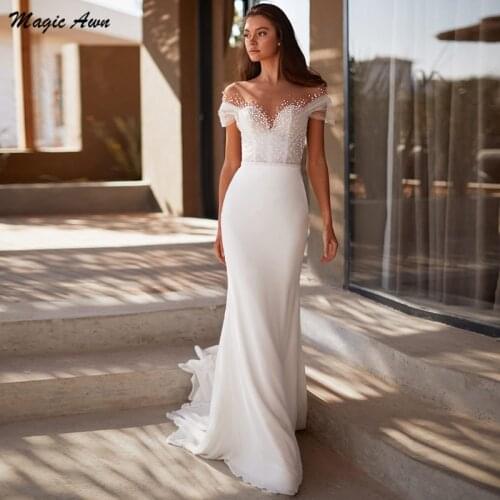 Magic Awn Beach Mermaid Wedding Dresses 2021 Illusionn Pearls Beaded Short Sleeves Boho Bridal Gowns Robe De Mariée