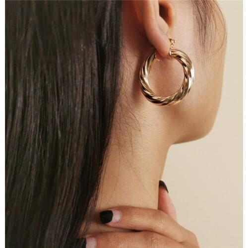 Kshmir European and American style spiral hemp pattern earrings fashion exquisite senior sense French earrings wholesale