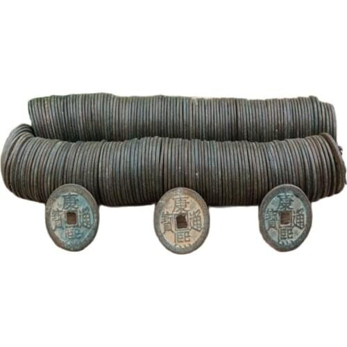 100 bronze coins and a string of Kangxi Tongbao from rural China