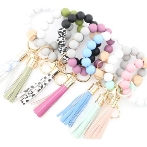 Party Favor Silicone Bead Bracelets Beech Tassel Key Chain Pendant Leather Bracelet Womens Jewelry 14 Style SN755