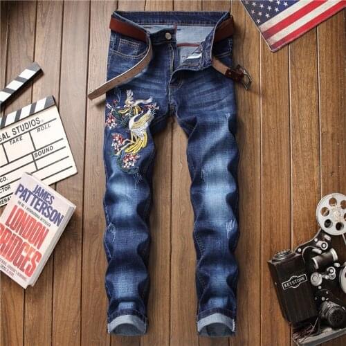2021 new net celebrity Korean fashion personality jeans mens embroidery flower tide brand hole trend retro style beggar feet tr