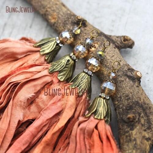 Coral Peach Orange Sari Silk Tassel Pendant with Antique Bronze Cap and Orange Crystal Accent PM9051
