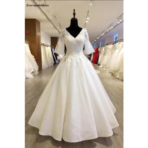 Modest Flare Sleeves Wedding Dress 2019 Floor Length Lace Appliques V-Neck Lace Up Back Plus Size Bridal Gowns Vestido de noiva