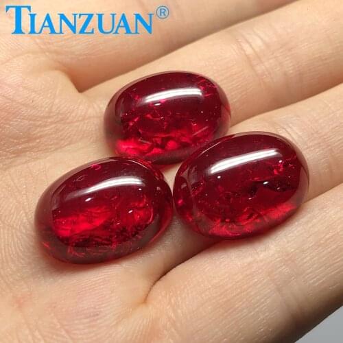Oval shape cabochon cut lab created ruby red stone with inculsions vs si clarity loose stone