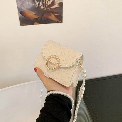 Net red fashion womens bag new 2021 burst pearl hand-held one-shoulder bag diamond embroidery line slanted bag hundred ins