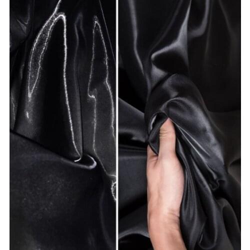 Reflective super bright crystal black silk satin fabric, down jacket suit windbreaker designer fabric
