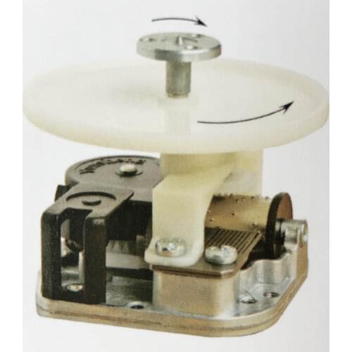 DIY music box mechanism with rotating shaft and plate in contrary direction